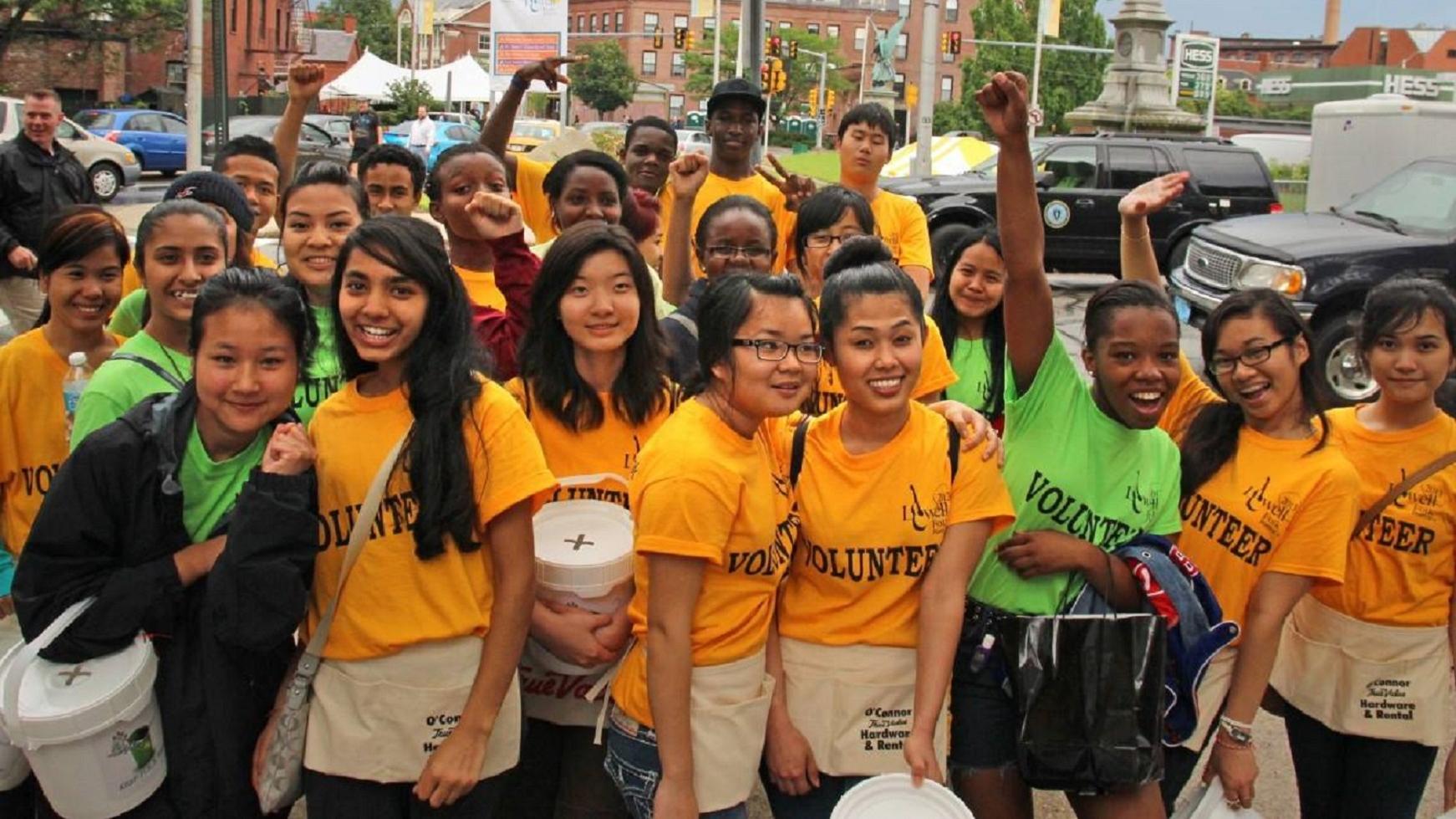 A group of volunteers pose together for a picture
