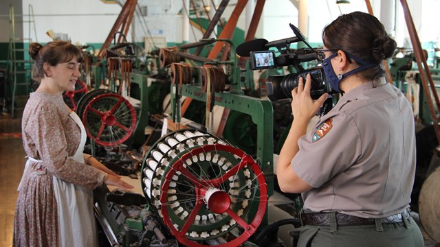 Ranger films woman operating a loom in mill girls' costume