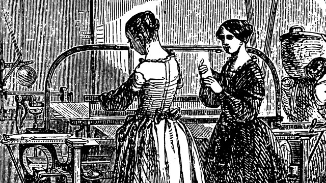 Two Mill Girls work on a power loom