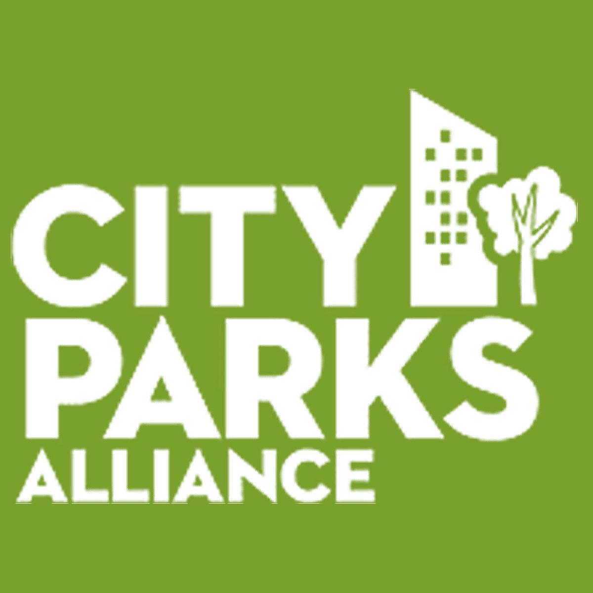 Logo with skyscraper and tree reads 