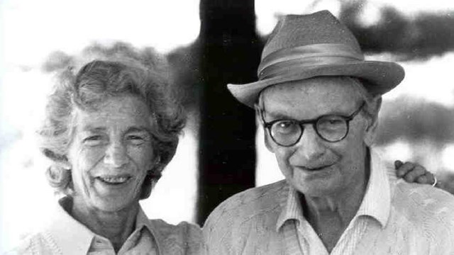 historic black and white photo of elderly man and woman looking at camera