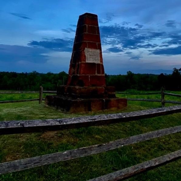 Color photo of Deep Cut Monument at Sunset