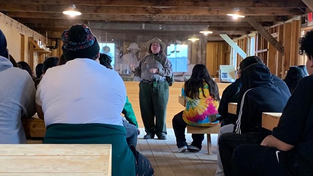 Ranger giving a program inside the replica mess hall