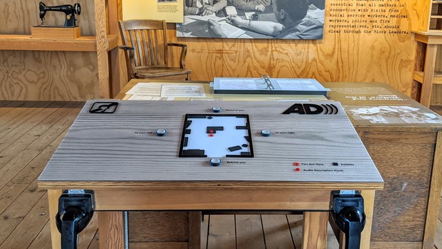 Assisted listening device in front of the Block Manager Exhibit