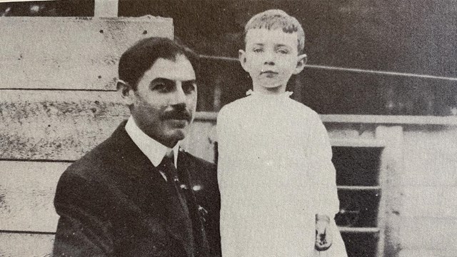 Oppenheimer pictured as a boy standing immediately left of his father Julius.