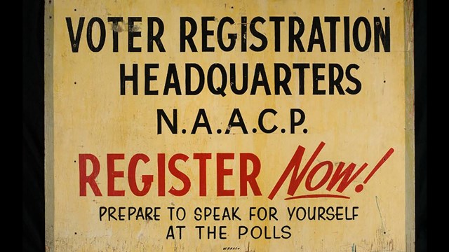 NAACP Voter Registration Headquarters sign