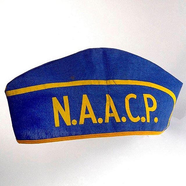 Blue cloth cap with gold trim and NAACP lettering