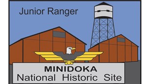 An illustration of barracks and a water tower, with the words, Junior Ranger