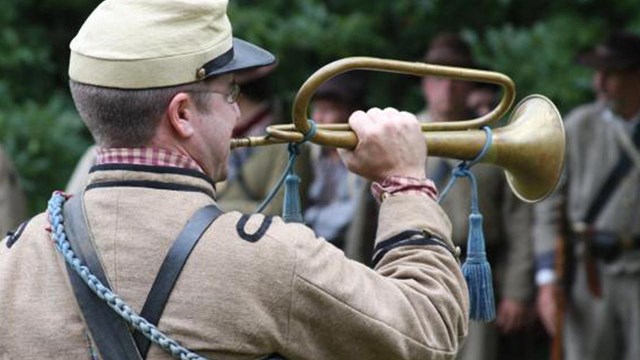 Bugler calling all to arms.