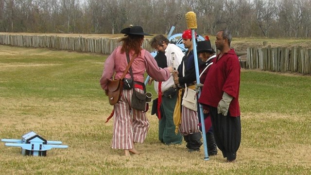 spanish soldiers line up in field