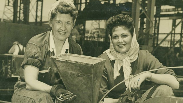 Two women in machine shop