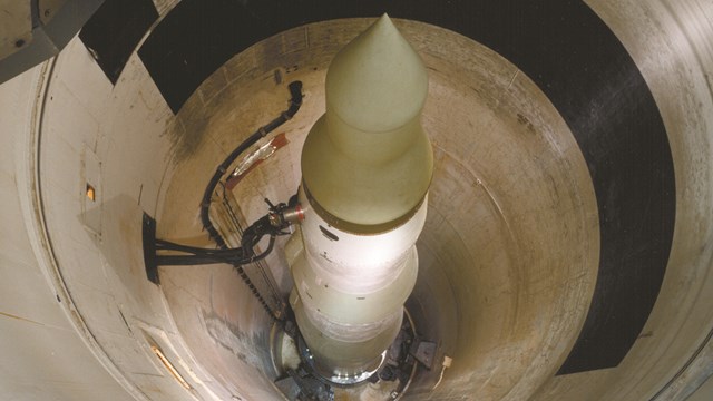 View down a round silo with a missile