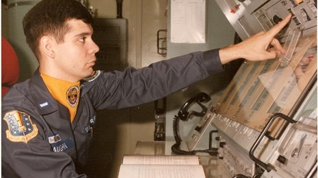 Officer at a launch control console