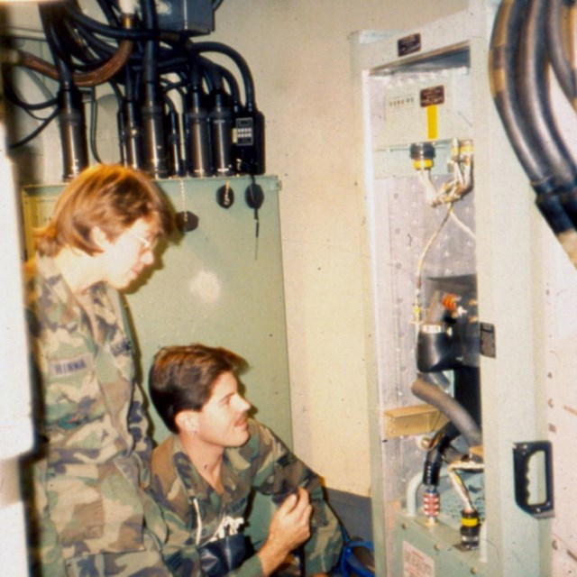 Crew of maintenance workers at a missile site