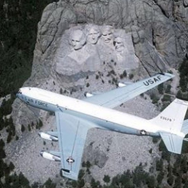 Air Force plane flies over Mount Rushmore