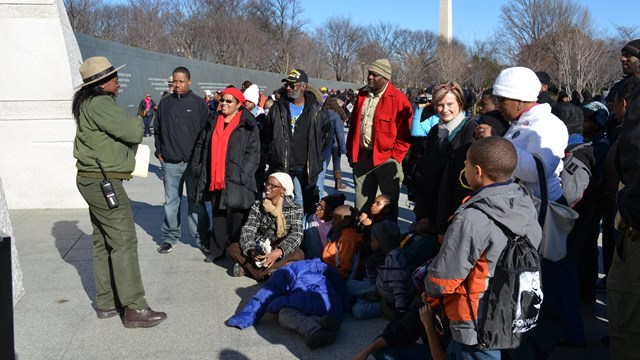 Ranger talking to a group of visitors at the Martin Luther King, Jr. Memorial