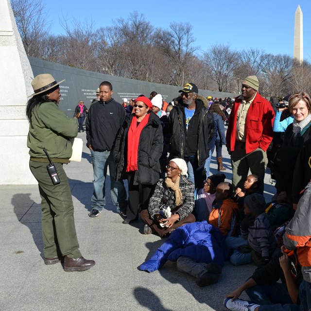 Ranger talking to a group of visitors at the Martin Luther King, Jr. Memorial
