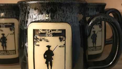 Coffee mugs with colonial soldier