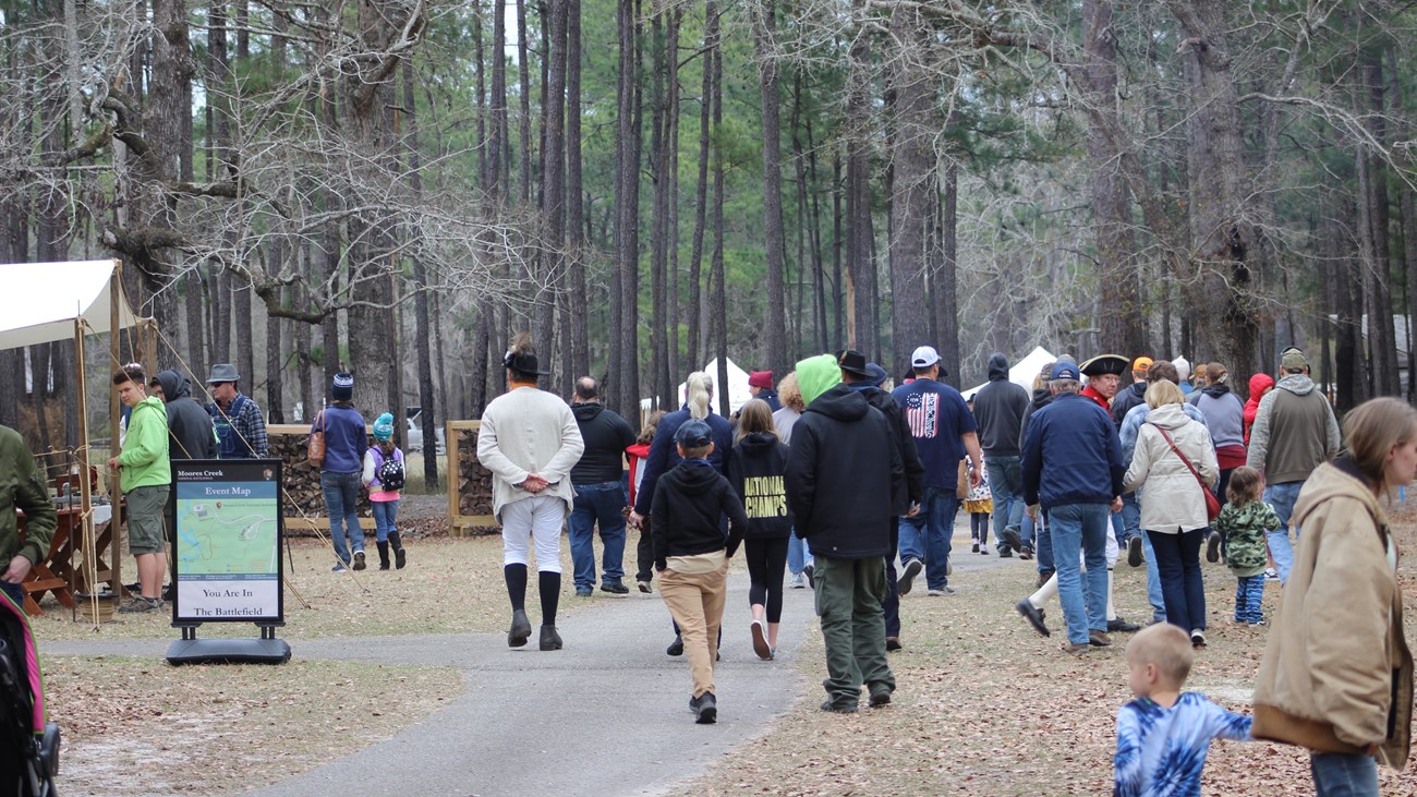 People walking through the Moores Creek Battlefield during the 246th Anniversary!