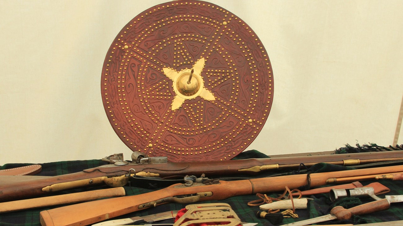 Scottish targe with assorted Scottish weapons