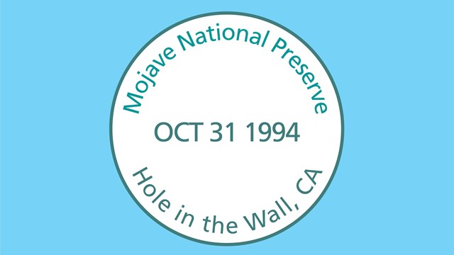 Round Stamp with text Mojave National Preserve, Hole in the Wall, CA OCT 31 1994