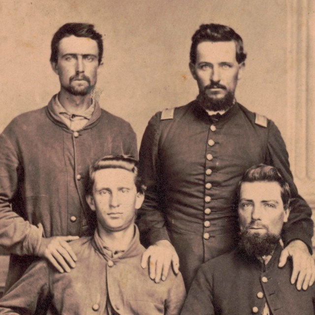 Four Union soldiers pose for a photograph
