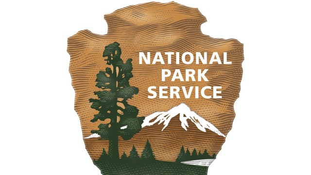 National Park Service Arrowhead design feature landscapes and wildlife.