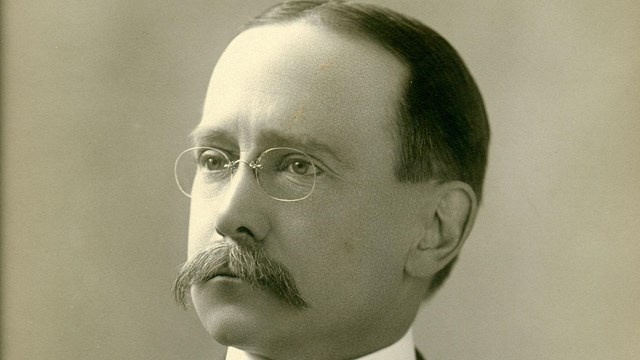 Black and white photo of Charles E. Rushmore.