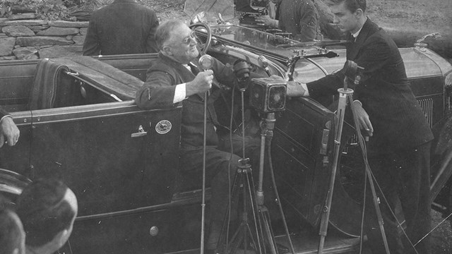 Black and white photo of Franklin D. Roosevelt speaking at Mount Rushmore on August 30, 1936.