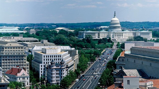 Image of the United States Capitol looking down Pennsylvania Avenue.