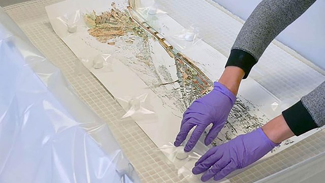 Link to Conserve O Gram titled How to Flatten Folded or Rolled Paper Documents
