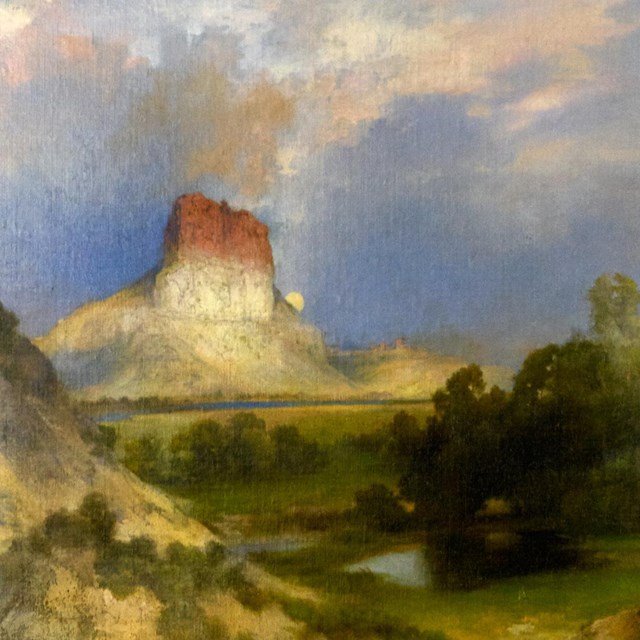 Thomas Moran painting titled Green River Cliffs