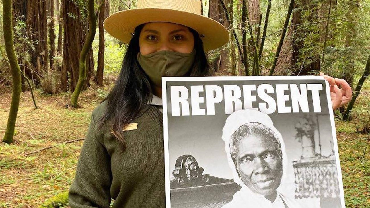 Ranger holds poster of Soujourner Truth