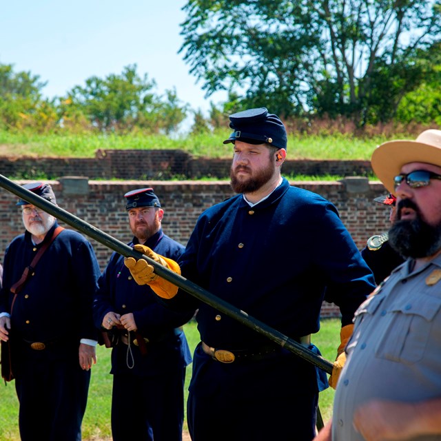 Actors reenacting war drills at Fort Washington 
