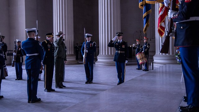 Men in uniform commemorate Lincoln's birthday.