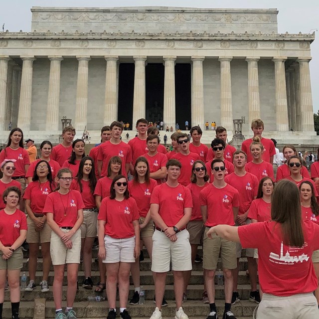 School choir singing on the steps of the Lincoln Memorial
