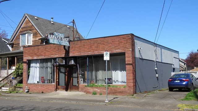 Exterior of Barber Shop, 1 story brick building