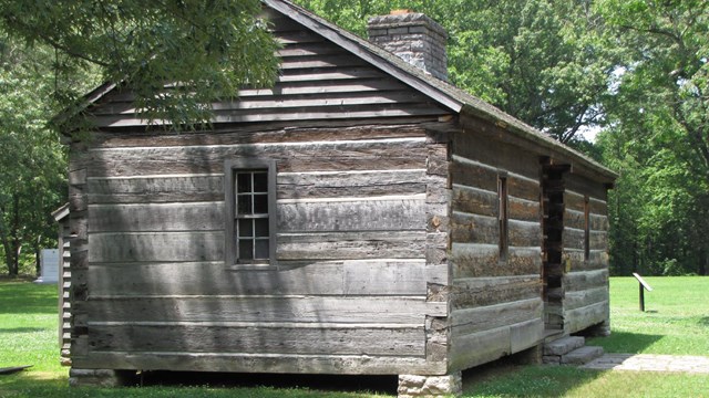 A dogtrot cabin. 