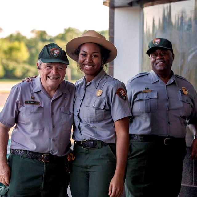 three diverse national park service employees
