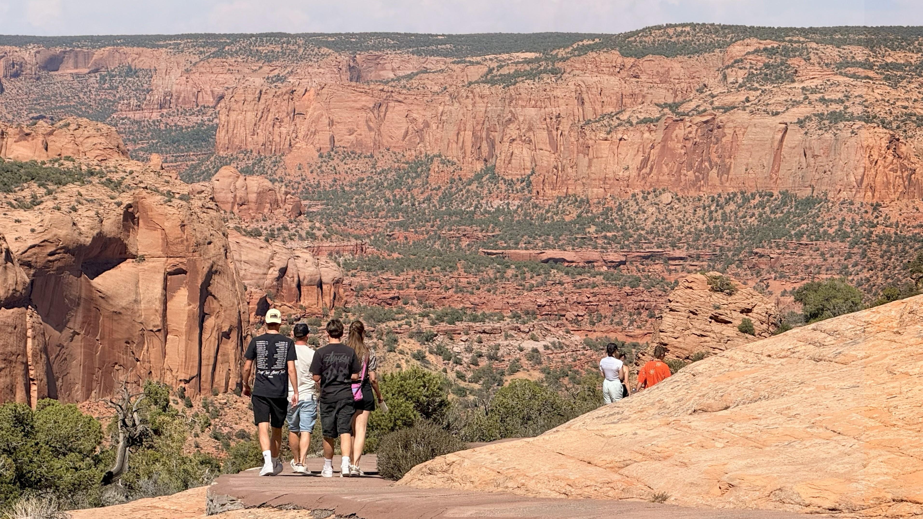 Visitors on the Sandal Trail that leads to the overlook