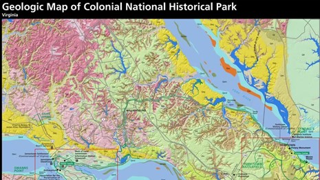 A colorful geologic map of Colonial National Historical Park with areas of pink, mint green, yellow