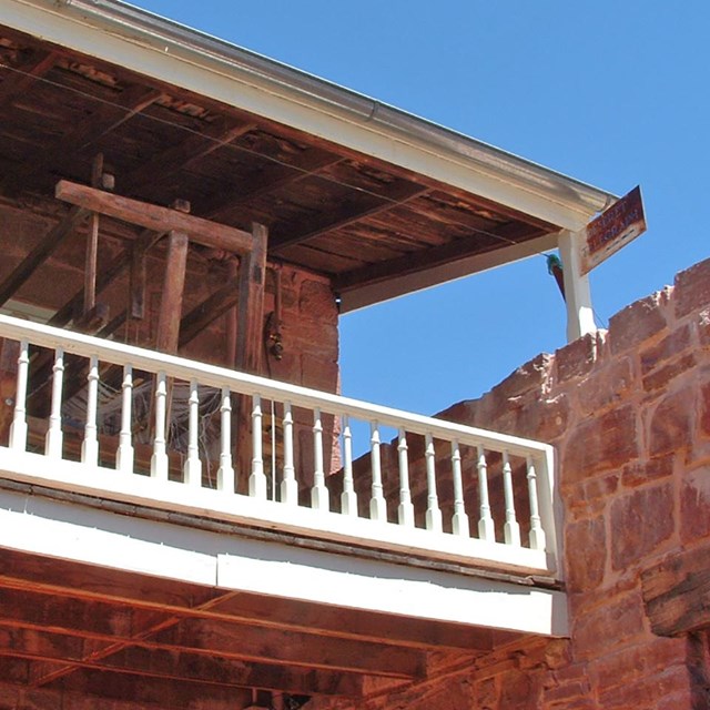 Brick building with telegraph wire