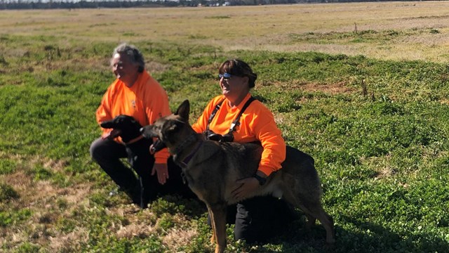 LASAR members. Left- Lisa Higgins and K9 Penny Lane. Right- Kirsten Watson and K9 Quest.