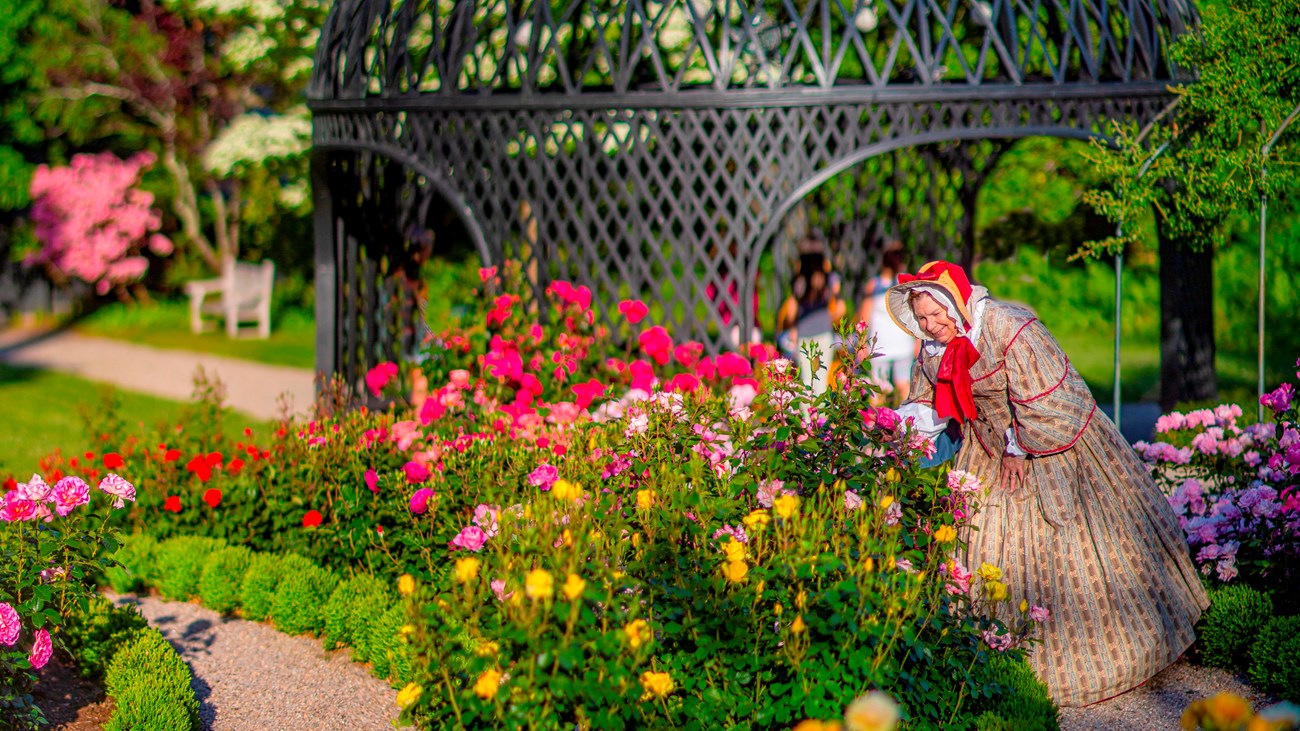 1850s lady standing in the RJD Garden