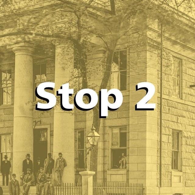 Yellow tint over a historic photo of the U.S. Custom House