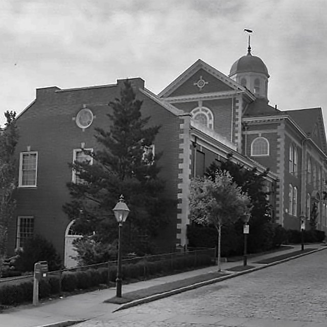 Historic black and white photo of the New Bedford Whaling Museum