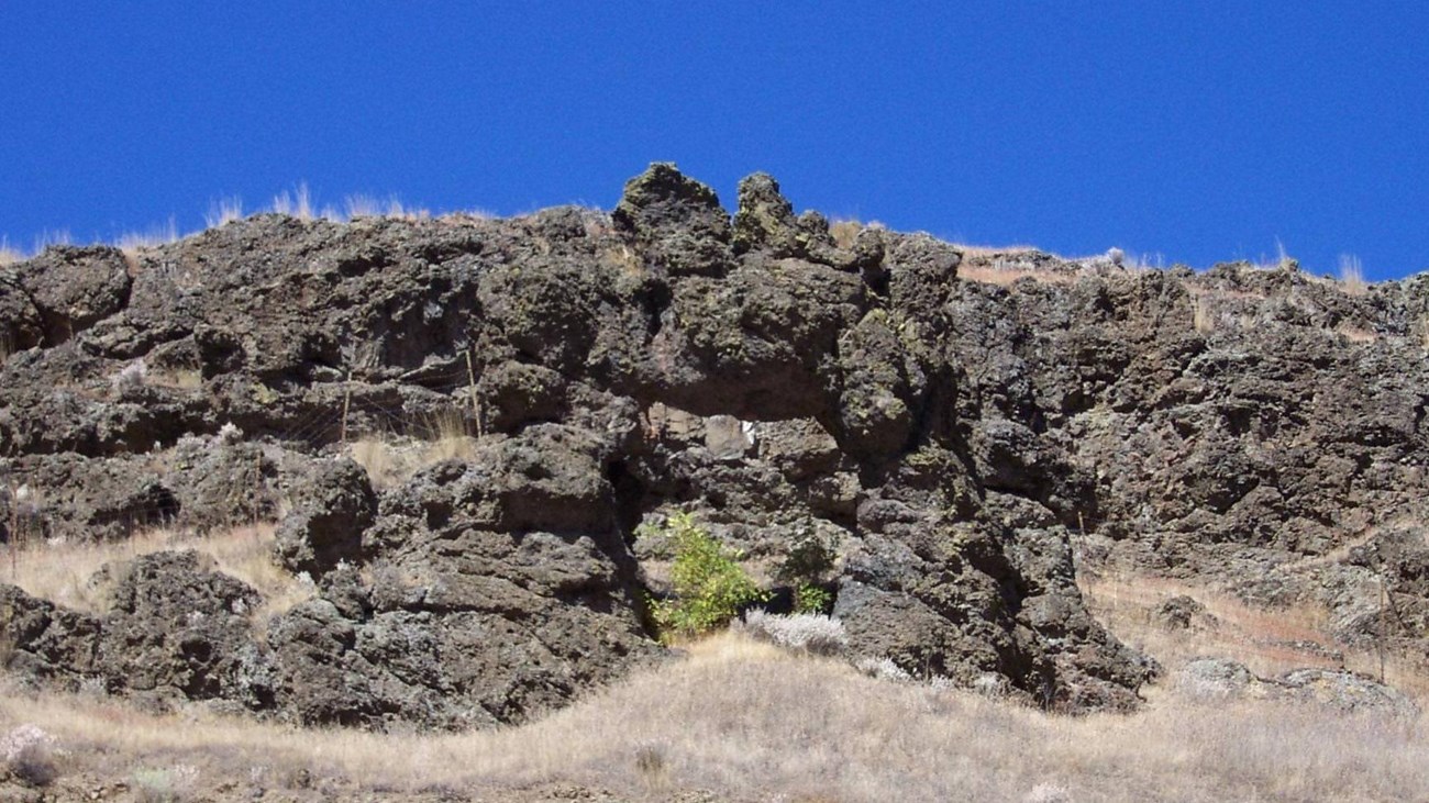 Basaltic rock outcropping on a hill