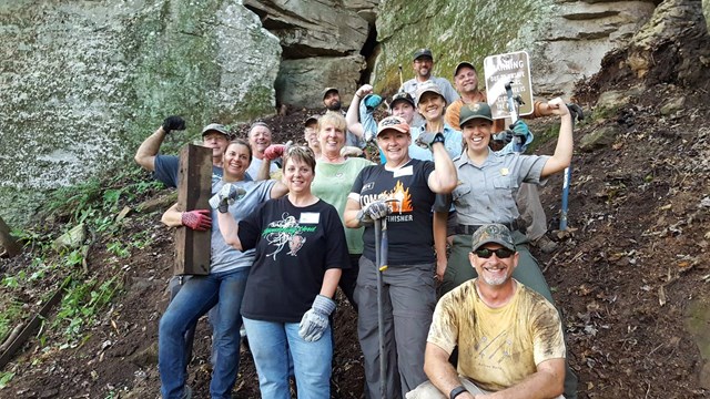 volunteers assisting with a work project in the park