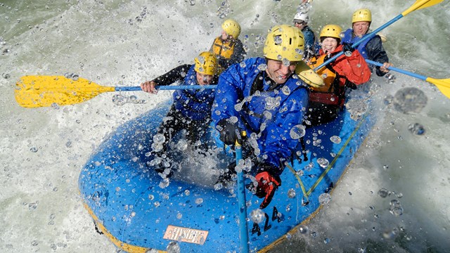 rafters crashing through a wave