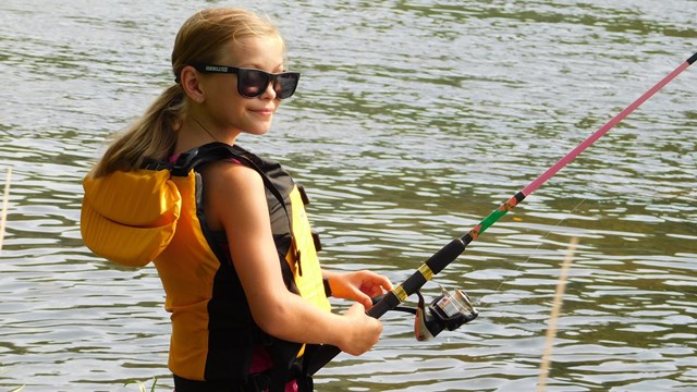 young girl fishing